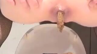 Beautiful Japanese girl shits in mouth of a lucky human toilet