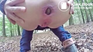 Girl pooping at woods