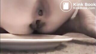 Woman shit big turd on a white plate