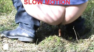 Female shitting in the dunes