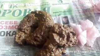Big shit from a sexy milf's asshole