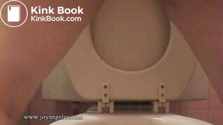 Sexy girl shits over the toilet for us