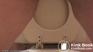 Sexy girl shits over the toilet for us