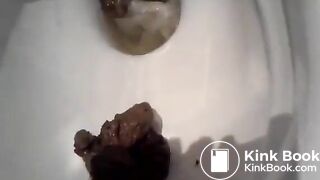 Short blond hair girl pooping on toilet