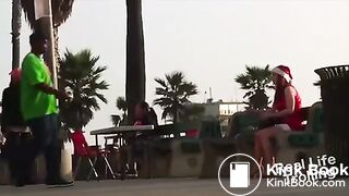 Sexy santa pretends to shit herself in public