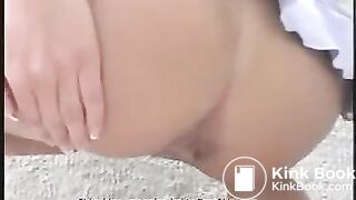 Brunette beauty shitting outside