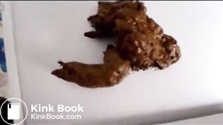 woman pooping into container - video 7