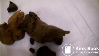 japanese girl in glasses spreads legs and shits