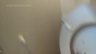 Ebony Sprays Toilet