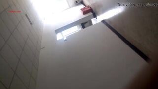 Chinese shitting on public squat toilet