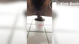 Young korean girl pooping in toilet