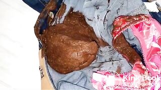 Hot blonde girl shit and play smear shit