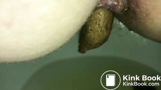 Big turd stuck in a sexy milf's ass