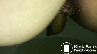 Big turd stuck in a sexy milf's ass