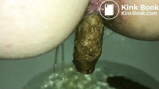 Big turd stuck in a sexy milf's ass
