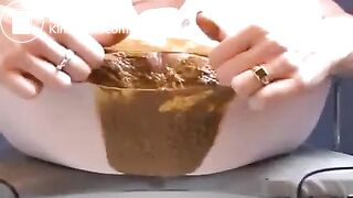 Hot brown poop in her pantyhos