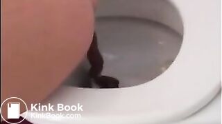 Sexy blonde girl shitting in the toilet