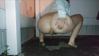 girl shits outside house