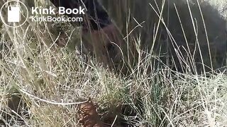 Pushing out a nice big turd in a field
