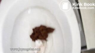 Iris pooping on the toilet