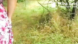 Girl pooping in forest