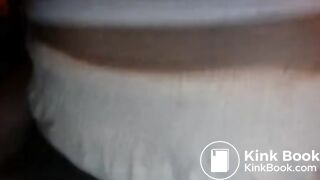 baby girl showing off her pooped diaper