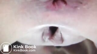 Blonde lady pooping outdoors in close up