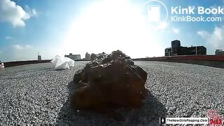 Girl pooping on rooftop 1