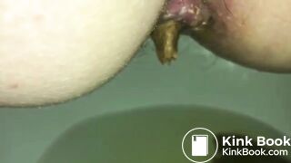 Peeing While Dropping a Firm Log into the Toilet