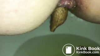 Peeing While Dropping a Firm Log into the Toilet