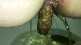 Peeing While Dropping a Firm Log into the Toilet