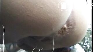 woman poops outside 006