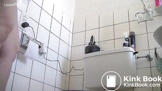 Swiss Milf in High Heels on the Toilet