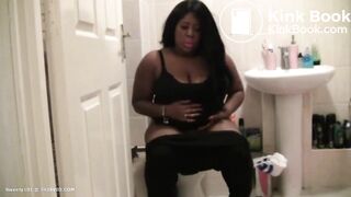 A ebony black girl shitting.