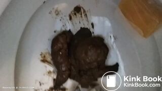 A ebony black girl shitting.