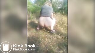 Girl poop in forest.