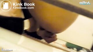 constipated chinese girl use enema in toilet