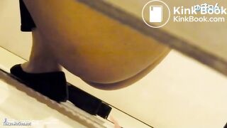 constipated chinese girl use enema in toilet