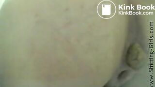 Girl shitting in public toilet