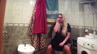 Mistress shitting in toilet