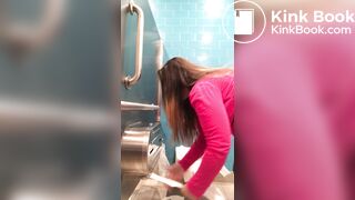 Pink shirt woman public toilet poop