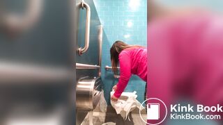 Pink shirt woman public toilet poop