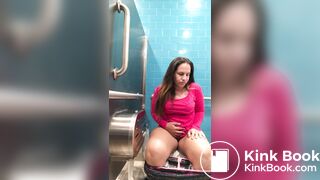 Pink shirt woman public toilet poop