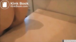 Young girl pooping on table