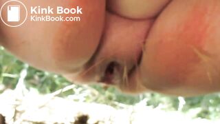 Girl walks and deposits piles everywhere in the woods