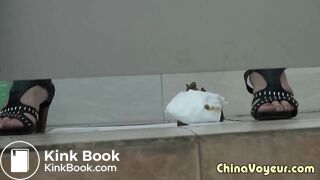 Girl in green dress pooping