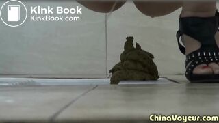 Girl in green dress pooping