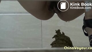 Girl in green dress pooping