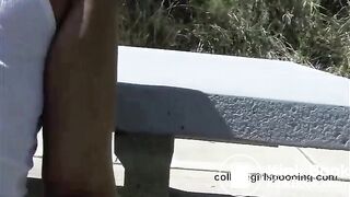 Two black chicks shitting from a public picnic table