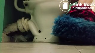 Girl with fluffy slippers pooping on the toilet